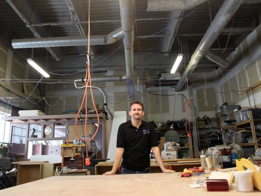 on Friday, Feb. 14, 2014. David Scrivner / Iowa City Press-Citizen Kirk Cheyney poses in the workshop at the Children's Museum in Coralville on Friday, Feb. 14, 2014. David Scrivner / Iowa City Press-Citizen